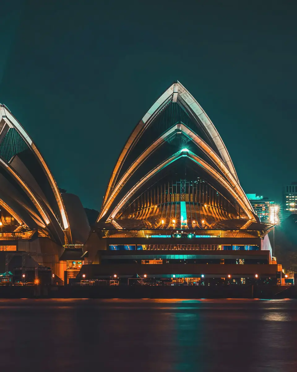 Sydney Harbour Bridge over the water with the city skyline in Australia.