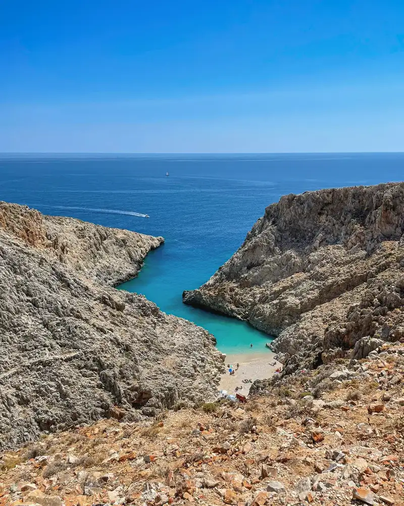 Coastal landscape with water and shoreline in Greece.