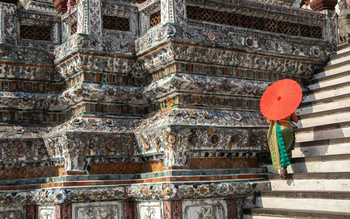 Ornate temple steps with parasol at Wat Arun.