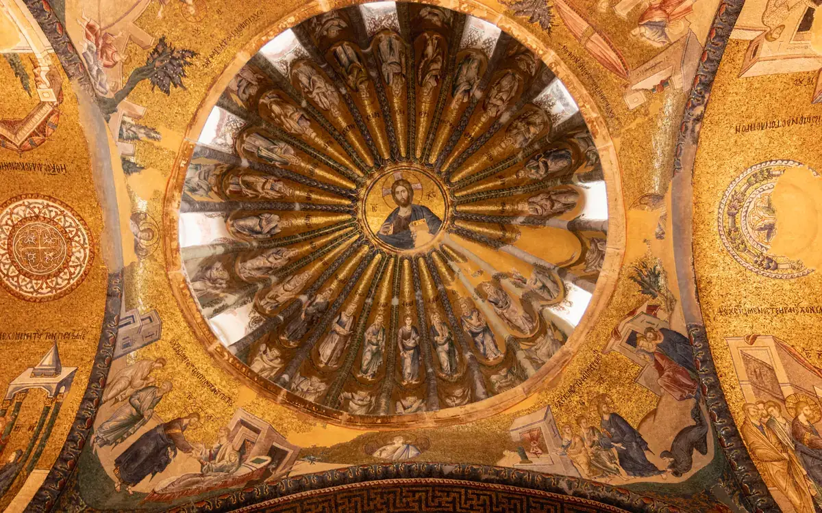 Gold-toned mosaics and ornament inside Kariye Church in Istanbul.