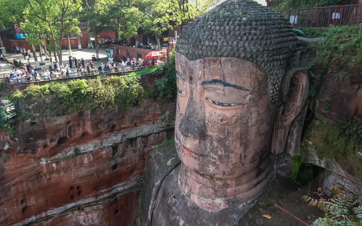 Large cliff-carved Buddha head at Leshan Giant Buddha.