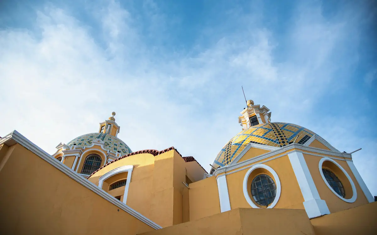 Yellow domes of the Church of Our Lady of Remedies above Cholula.