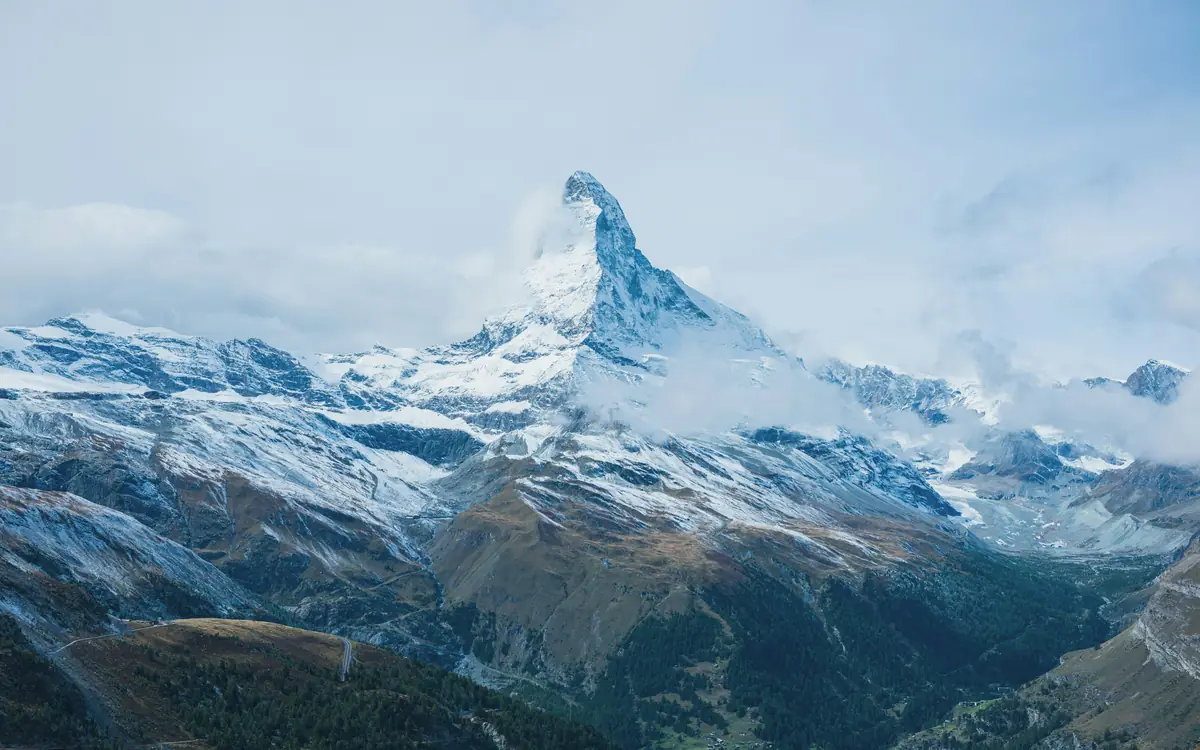 Matterhorn above snowy ridges.