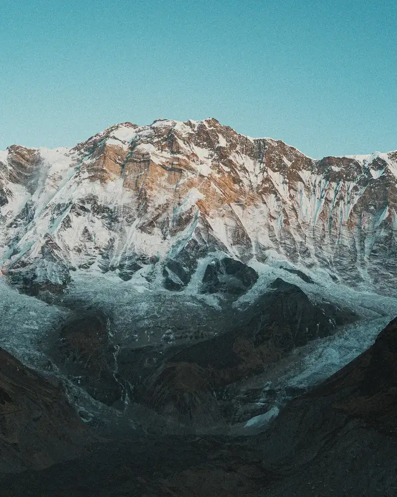 Photo of a mountain or valley landscape in Nepal.