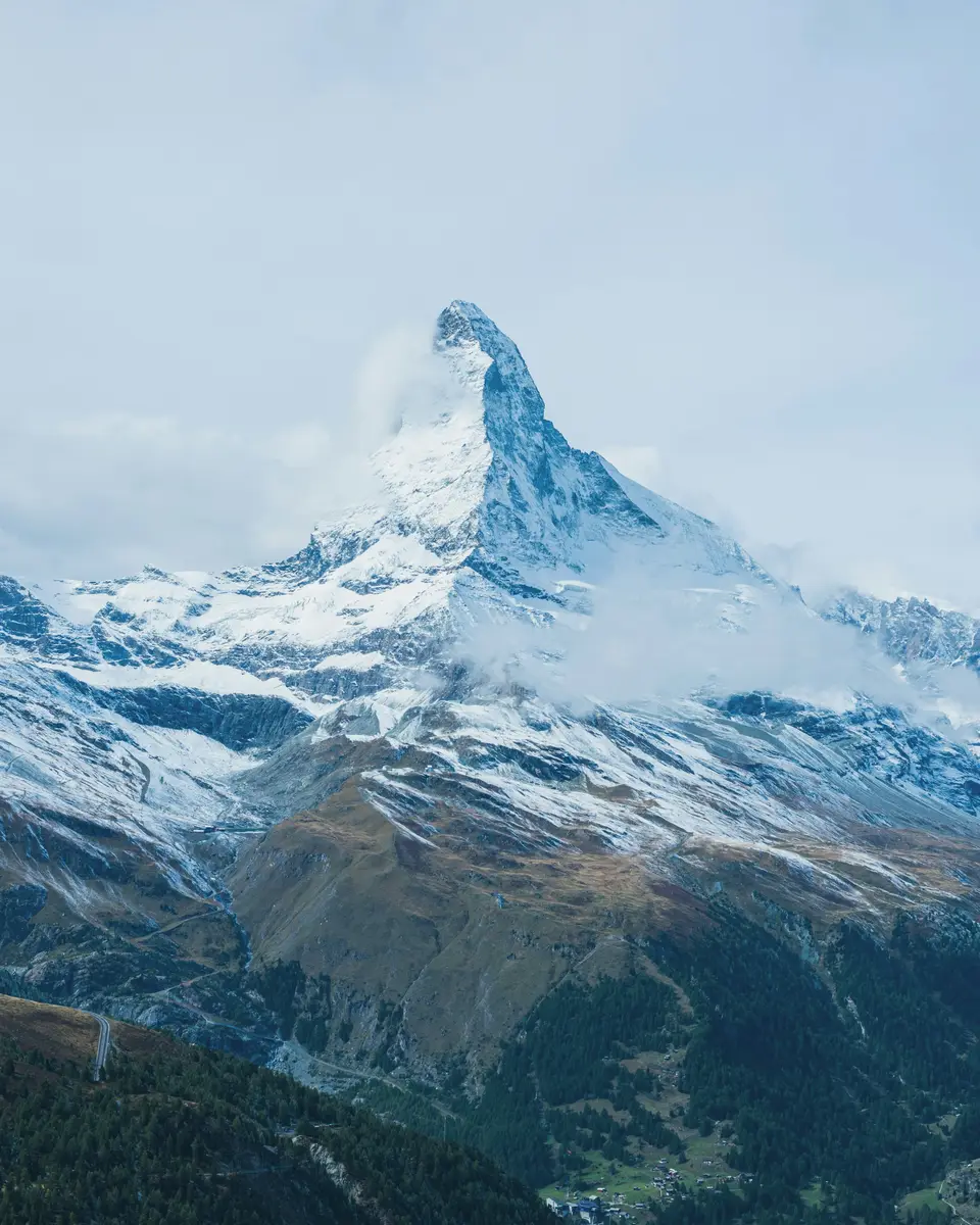 Photo of a mountain or valley landscape in Switzerland.