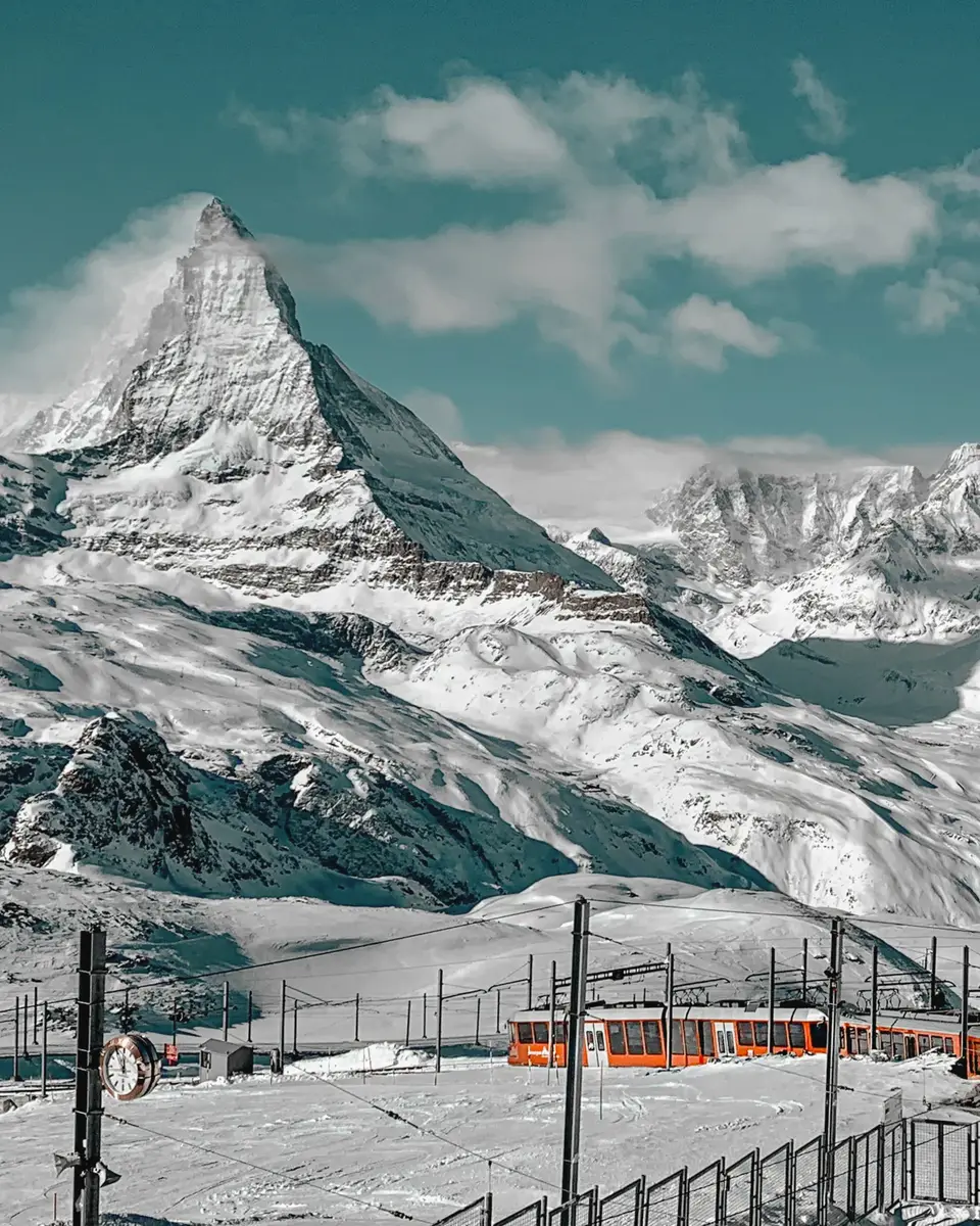 Photo of a mountain or valley landscape in Switzerland.